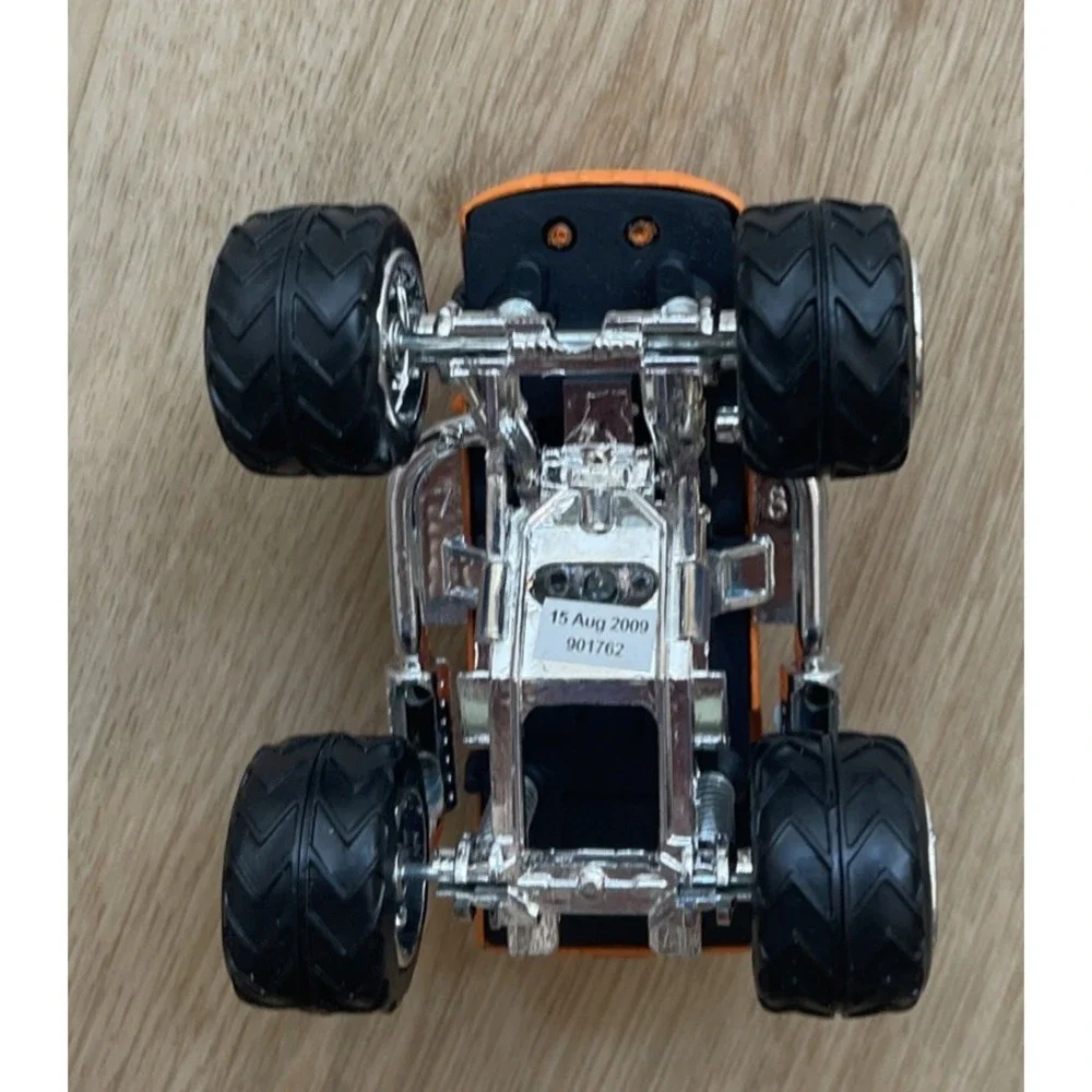 Monster Truck #39 Expert Gasoline Orange 4x4 Diecast Vehicle 1:43 4